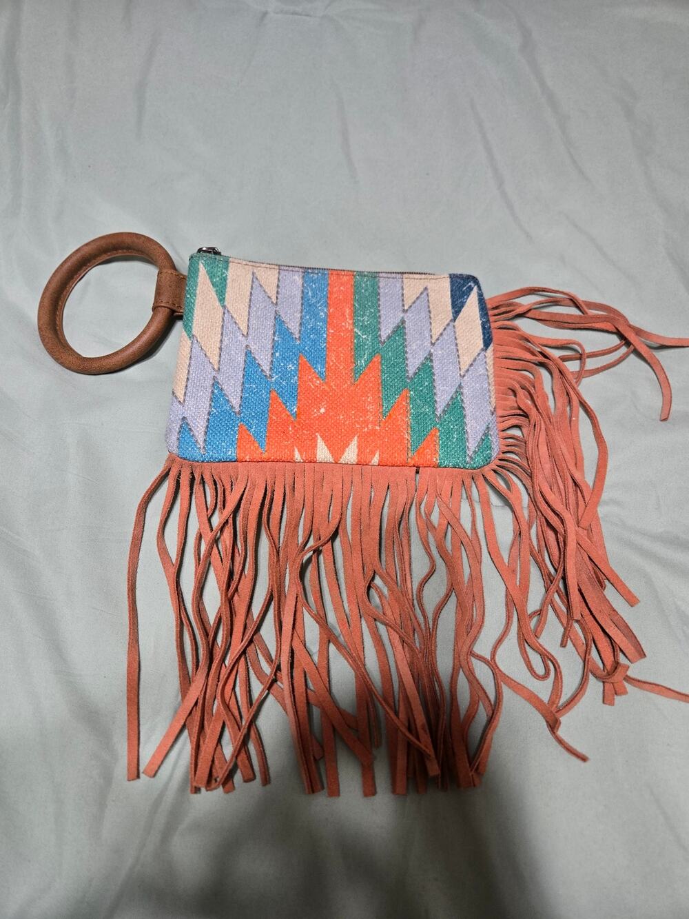 Montana west aztec printed fringe handle wristlet